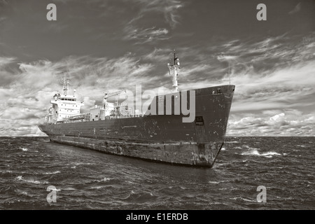 Photo of a tanker ship on sea in black and white tone. Stock Photo