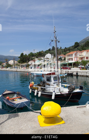 Village of Agia Efimia, Kefalonia. Picturesque view of fishing boats moored at Agia Efimia’s Harbour. Stock Photo