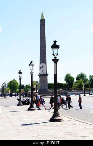 Place de la Concorde Paris France monument pedestrians crossing road Stock Photo