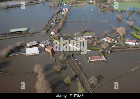 Aerial view of a flooded hamlet near Northmoor Green on the Somerset levels Stock Photo