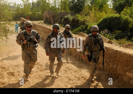 From left, U.S. Army Capt. Jarrett Gafford, Jewell Bealmear, Sahel, an interpreter, and Air Force Master Sgt. Matthew Ruchti, w Stock Photo