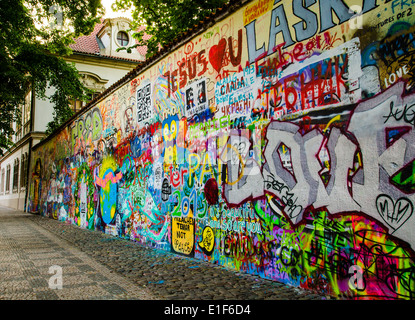 Graffiti Wall next to a historic building in Old Prague Stock Photo