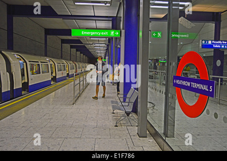 Heathrow Terminal 5 Underground Station showing roundel, Heathrow Airport, London Borough of Hillingdon, London, England, UK Stock Photo