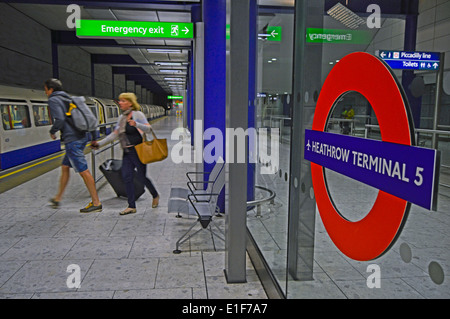 Heathrow Terminal 5 Underground Station showing roundel, Heathrow Airport, London Borough of Hillingdon, London, England, UK Stock Photo