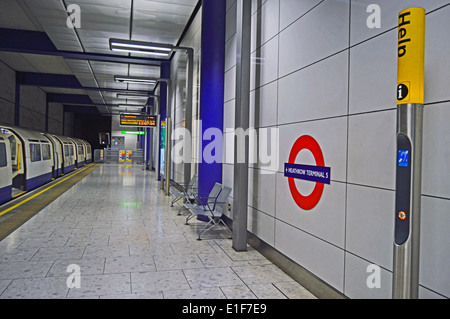 Heathrow Terminal 5 Underground Station showing roundel, Heathrow Airport, London Borough of Hillingdon, London, England, UK Stock Photo