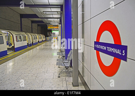 Heathrow Terminal 5 Underground Station showing roundel, Heathrow Airport, London Borough of Hillingdon, London, England, UK Stock Photo