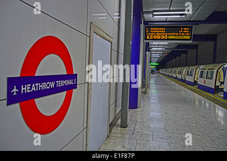 Heathrow Terminal 5 Underground Station showing roundel, Heathrow Airport, London Borough of Hillingdon, London, England, UK Stock Photo