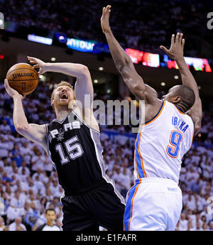 May 31, 2014 - Oklahoma City, OKLAHOMA, USA - San Antonio Spurs' Matt Bonner shoots around Oklahoma City Thunder's Serge Ibaka during first half action in Game 6 of the Western Conference finals Saturday May 31, 2014 at Chesapeake Energy Arena in Oklahoma City, OK. (Credit Image: © San Antonio Express-News/ZUMAPRESS.com) Stock Photo