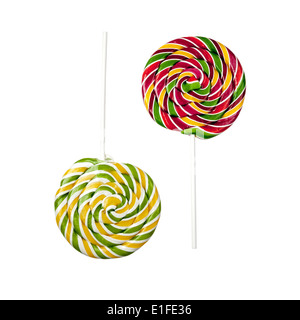 Two opposite lollipops isolated on white background Stock Photo