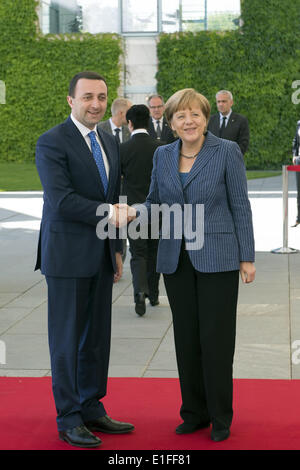 Berlin, Germany. 2nd June, 2014. German Chancellor Angela Merkel give welcomes the Prime Minister of Georgia, Irakli Garibashvili with military honors in the Federal Chancellery in Berlin, on June 2, 2014. © Goncalo Silva/NurPhoto/ZUMAPRESS.com/Alamy Live News Stock Photo