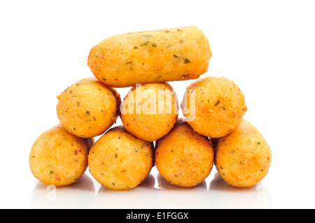 a pile of croquetas de bacalao, spanish codfish croquettes, on a white background Stock Photo