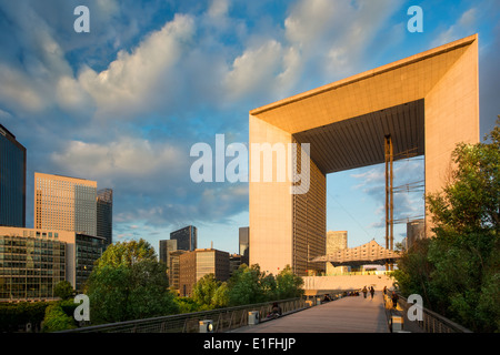 Setting sunlight on the Grande Arche and buildings of La Defense, Paris France Stock Photo