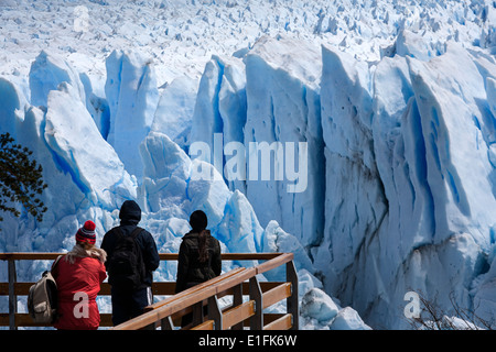 Tourists contemplating the Perito Moreno glacier from the platform view. Los Glaciares National Park. Patagonia. Argentina Stock Photo