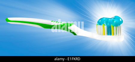 Tooth brush with tooth paste on blue background. Stock Photo