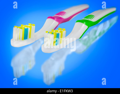 Tooth brushes on blue background. Stock Photo