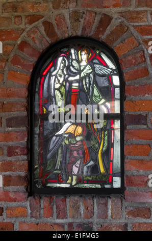 stained glass window in a small chapel Stock Photo