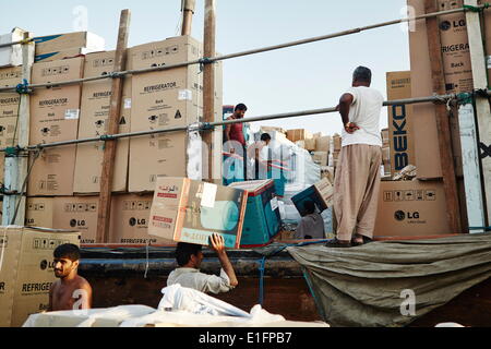 Free-trade port Dubai Creek, with dhows piled high with a range of goods, Dubai, United Arab Emirates, Middle East Stock Photo