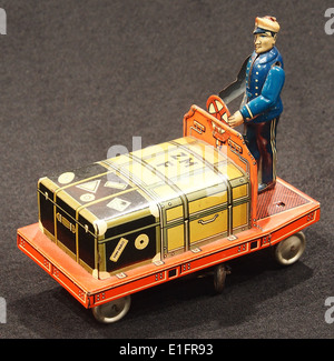 Tin toy suitcase trolley, Stock Photo