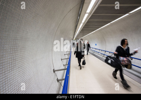 Passengers walking through passage in London Underground Station Stock Photo