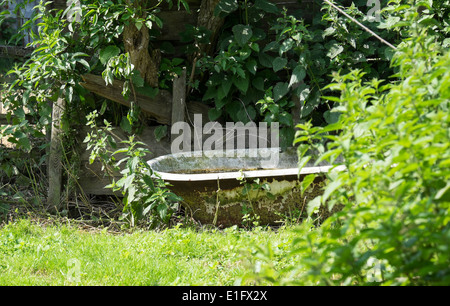 Bathtub placed in countryside and used as spring water trough, exilles,  Italy Stock Photo - Alamy