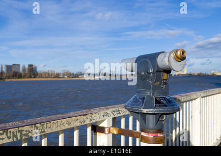 telescope over de schelde river in antwerp, belgium Stock Photo