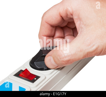 Close-up of inserting electric plug into socket Stock Photo - Alamy