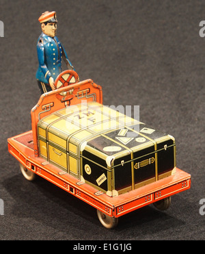 Tin toy suitcase trolley, Stock Photo