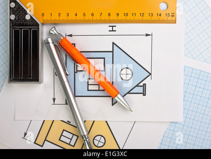 development drawings and tools on graph paper Stock Photo