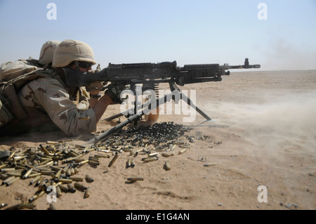 U.S. Navy Construction Mechanic 3rd Class Justin Winters, a Seabee attached to Naval Mobile Construction Battalion (NMCB) 5, fi Stock Photo