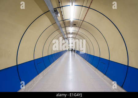 Passengers walking through passage in London Underground Station Stock Photo