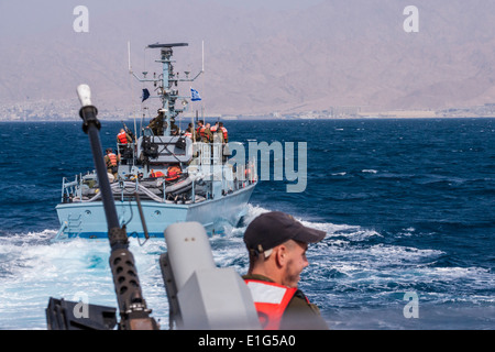 Israel. Navy patrol boats near the city of Eilat and the Israeli-Jordanian border. The city of Aqaba in the background. Stock Photo