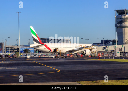 Emirates airline Boeing B777 twin jet aircraft at Christchurch International Airport, Canterbury, South Island, New Zealand Stock Photo