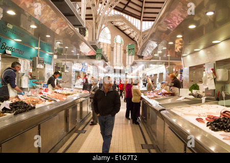 Indoor market and fishmongers in Valencia Spain Stock Photo