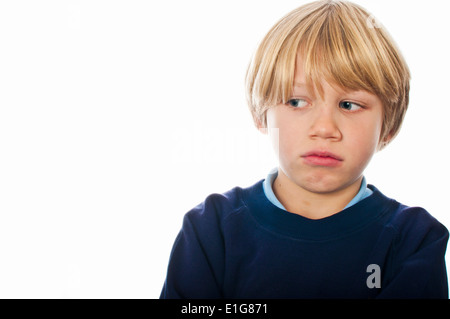 Scared school boy Stock Photo