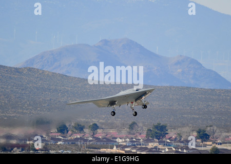 An X-47B Unmanned Combat Air System Demonstrator (UCAS-D) completes its first flight at Edwards Air Force Base, Calif., Feb. 4, Stock Photo