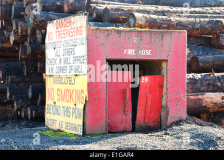 Fire Hydrant and Fire Hose house at a lumber mill site Stock Photo