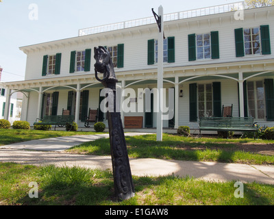 Horse shaped hitching post in front of Oysterponds Historical Society, Orient, New York, USA, May 12, 2014 © Katharine Andriotis Stock Photo