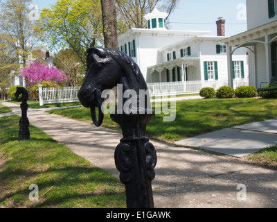 Horse shaped hitching post in front of Oysterponds Historical Society, Orient, New York, USA, May 12, 2014 © Katharine Andriotis Stock Photo