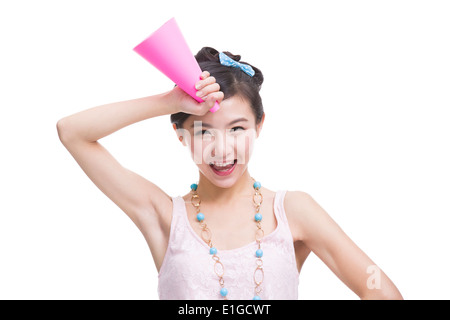 Cute young woman with megaphone Stock Photo