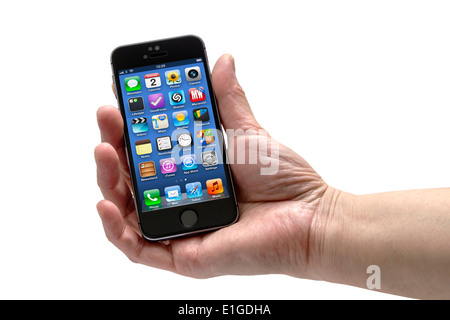 Iphone in a womans hand Stock Photo