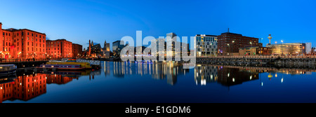 panoramic view of Liverpool skyline reflected in river mersey at albert dock Stock Photo