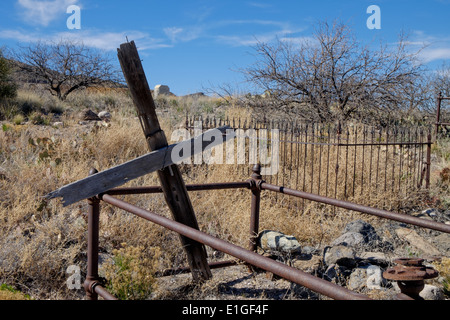 An old miner's grave in the cemetery at the old copper mining town of Jerome, Arizona, USA. Stock Photo