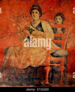 A Roman fresco, discovered in Pompeii, depicits a woman seated on a bronze chair, with a back, playing a Greek musical instrument called a Kithara. Chairs with a back for the Romans was a symbol of dignity or respect, reserved for high officials or woman of rank (the ceremonial use of thrones a vestige of this tradition) such as the woman in this fresco. Dated 50 B.C. Stock Photo