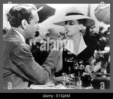 Now, Voyager is a 1942 American drama film starring Bette Davis, Paul Henreid, and Claude Rains, and directed by Irving Rapper. Stock Photo
