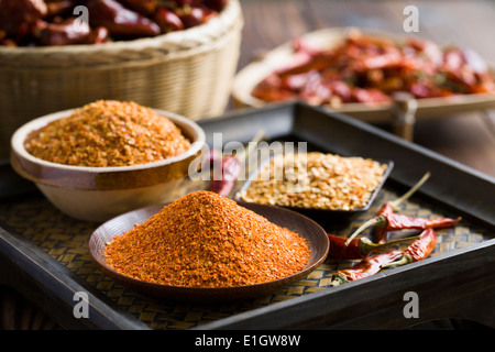 Red chili peppers and powder Stock Photo