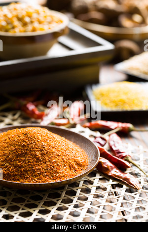 Red chili peppers and powder Stock Photo