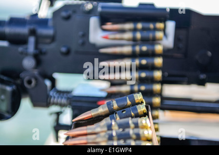 Ammunition belt for a General Purpose Machine Gun (GPMG), turrett mounted on a Royal Navy ship Stock Photo