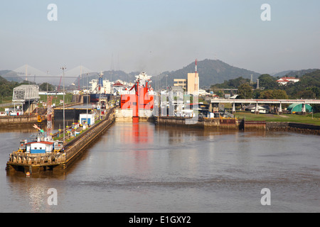 Approaching the Mira Flores lock in the Panama Canal, cargo ships are in the chambers, Panama, Central America. Stock Photo