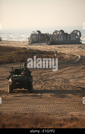 A U.S. Marine Corps Light Armored Vehicle with the 11th Marine Expeditionary Unit (MEU) arrives to provide security during a hu Stock Photo