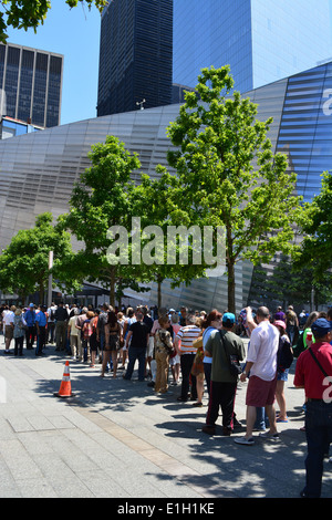 People waiting in line and the National 9/11 Memorial Museum at Ground Zero in Lower Manhattan. Stock Photo